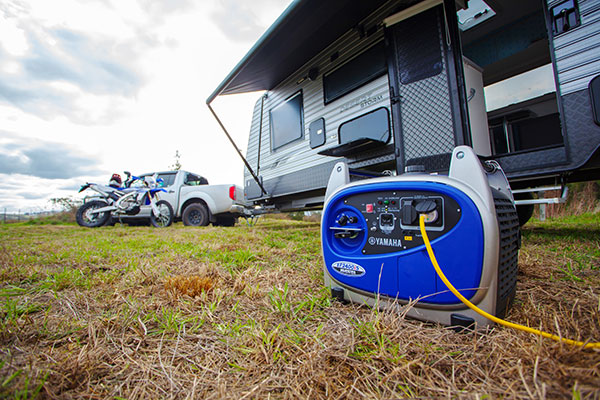 Yamaha EF2400iS generator in front of a caravan